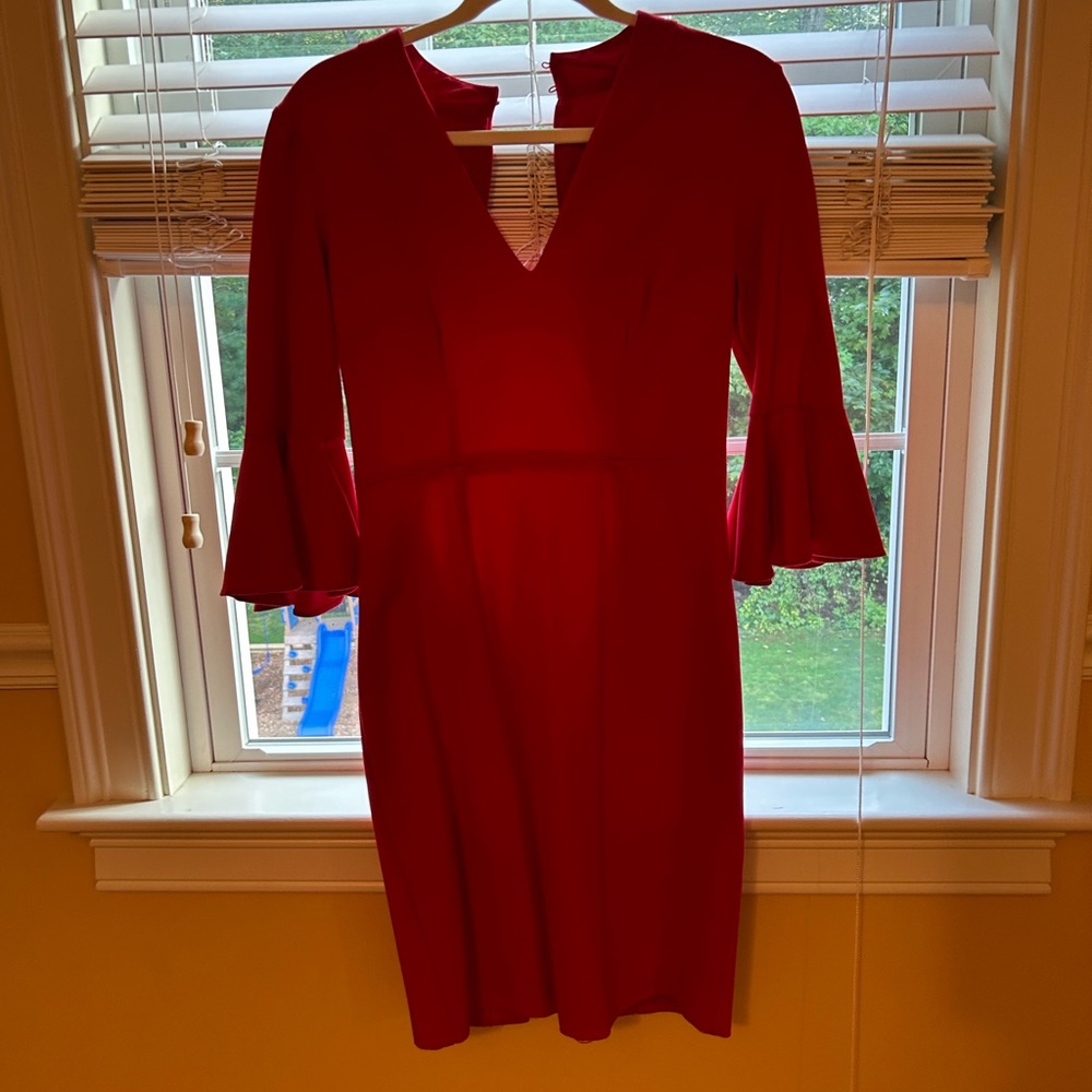 Flattering red dress.